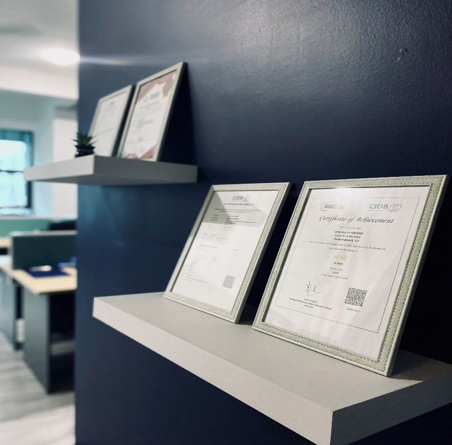 Deqara's CIDB and SME Corp registration certificates displayed at the office